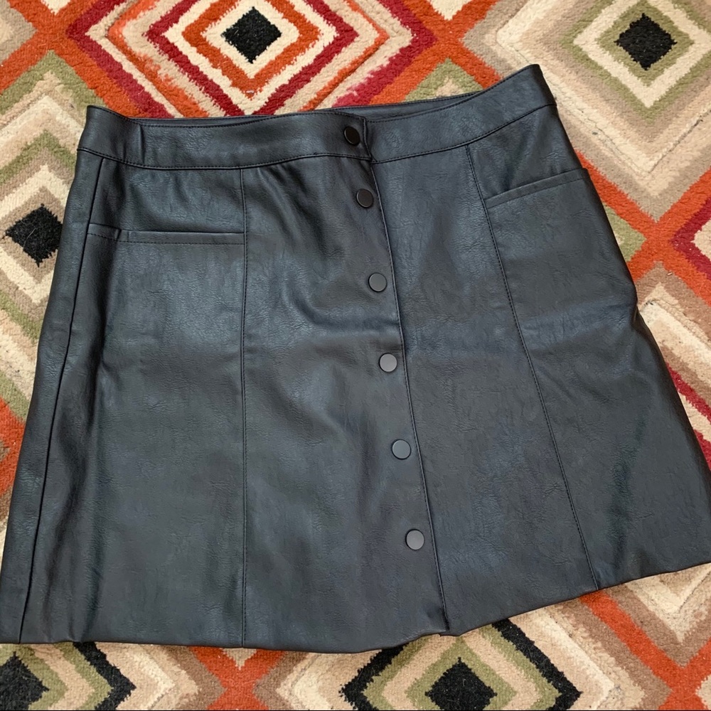 Black leather mini skirt